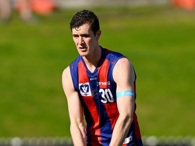 MELBOURNE, AUSTRALIA - JULY 17: Ethan Phillips of the Borough takes possession of the ball during the round 16 VFL match between Port Melbourne and Collingwood at ETU Stadium on July 17, 2022 in Melbourne, Australia. (Photo by Morgan Hancock/AFL Photos)