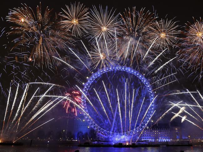 Fireworks explode over the London Eye during the New Year's eve celebrations. Picture: AP