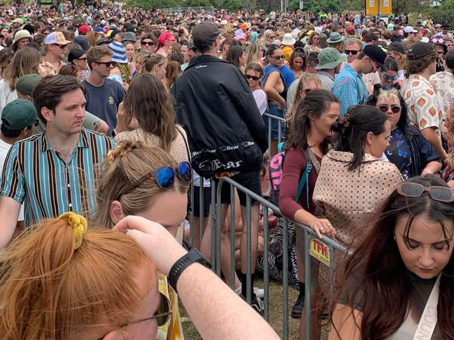 Hundreds of people waiting to get through the gates at Spilt Milk
