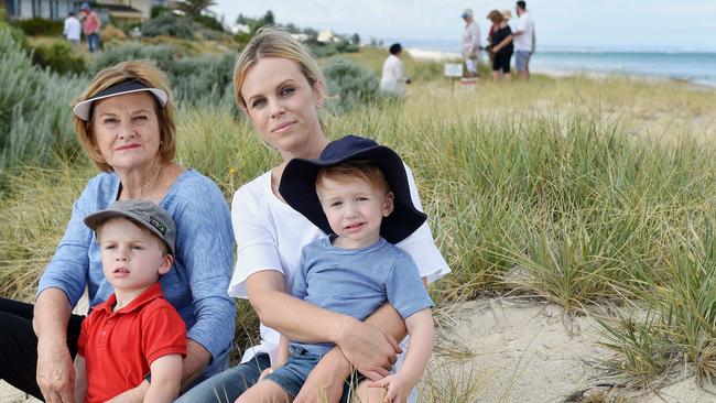 Monique Webber, who grew up at Tennyson and retains close connections with the area, is pictured with her young sons Tennyson and William, and her mum, Denise Webber. She wants to ensure the dunes are protected. Picture: Roger Wyman