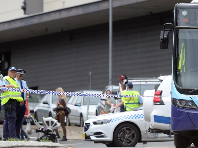 Pictured is the scene on Grafton Street at Bondi Junction where a woman in her 20's has been struck and killed by a bus.Picture: Richard Dobson