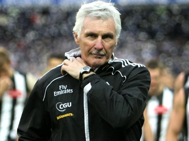 10/01/2011 SPORT: AFL 2011 Grand Final, Collingwood v Geelong at the MCG. Collingwood Coach Mick Malthouse leaves the ground for the last time after their loss to Geelong.