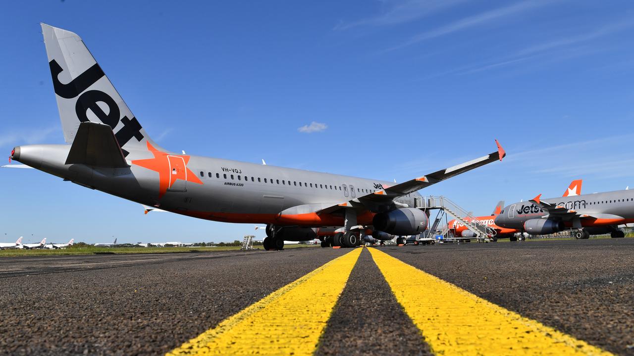 Grounded Jetstar aircraft parked at Brisbane Airport. Picture: Darren England/AAP