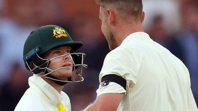 Australian captain Steve Smith (left) and England bowler Stuart Broad exchange words on Saturday.