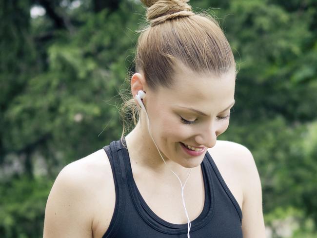 Enjoying music while exercising. Music exercise generic. Thinkstock