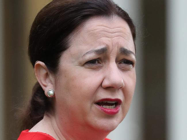 Premier Anastasia Palaszczuk makes a media announcement and gets her flu vaccination.  Pic Peter Wallis