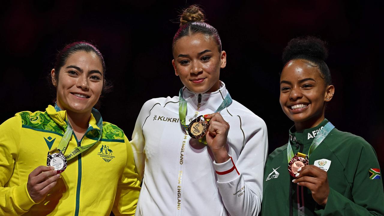 Silver medallist Australia's Georgia Godwin (L), gold medallist England's Georgia-Mae Fenton (C) and bronze medallist South Africa's Caitlin Rooskrantz.