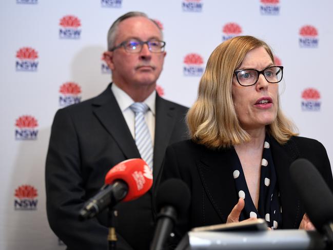 Health Minister Brad Hazzard (left) and NSW Chief Health Officer Dr Kerry Chant during an announcement regarding 2020 influenza vaccine, in Sydney, Monday, March 2, 2020. (AAP Image/Joel Carrett) NO ARCHIVING