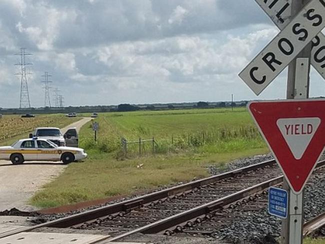 Police at the scene of a hot-air balloon crash in Lockhart, Texas.