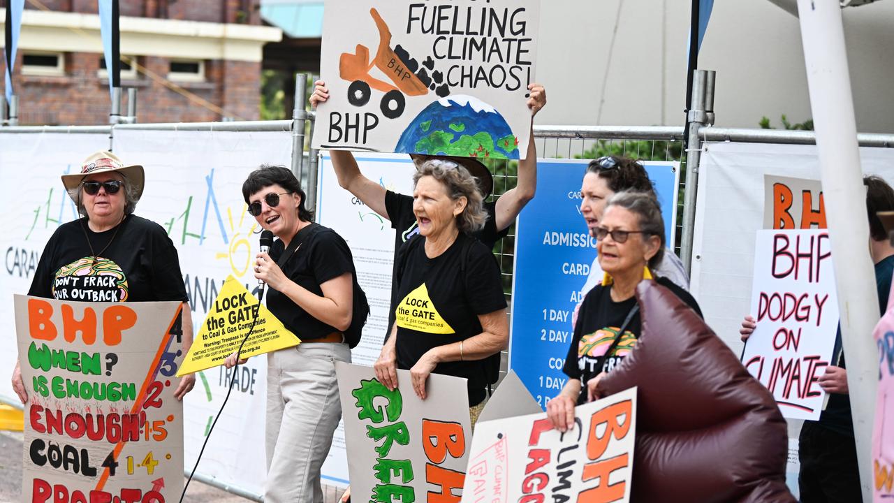 Climate change protesters from Lock the Gate Alliance hold a small rally outside BHP’s annual general meeting