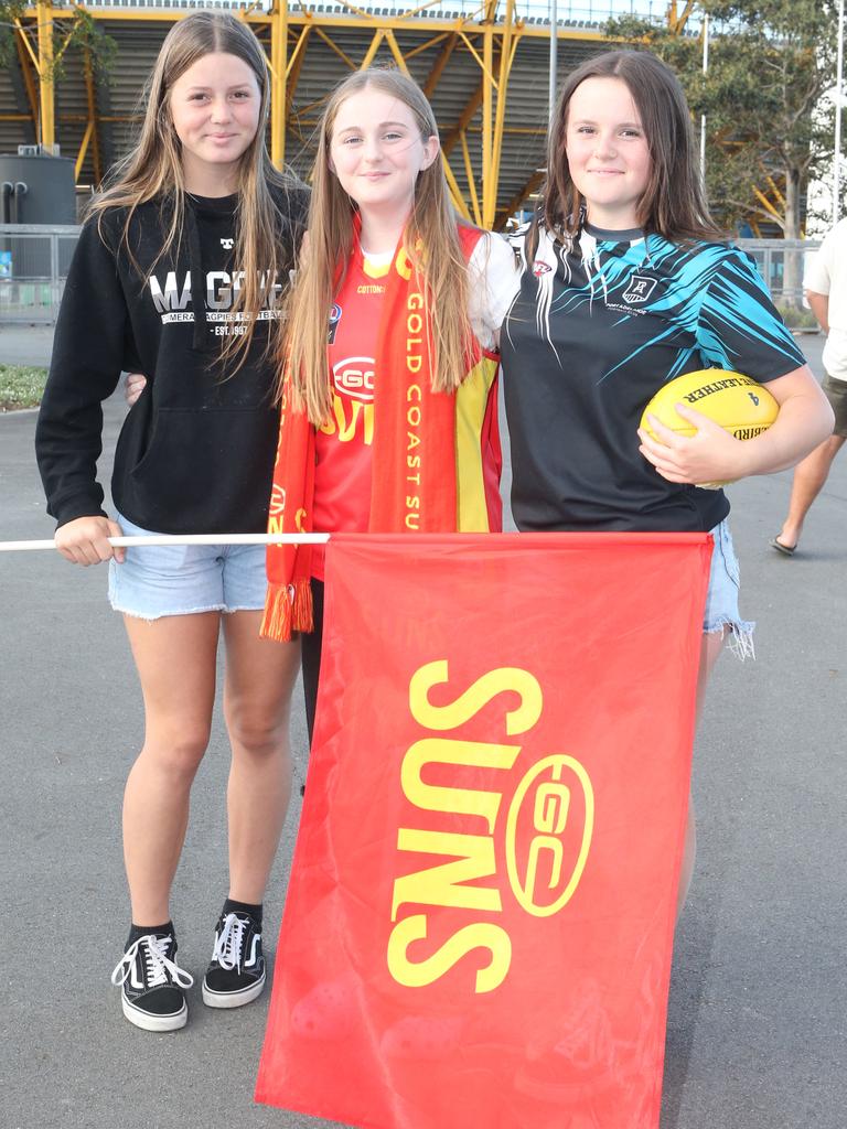 The Gold Coast Suns will host its first AFLW final when they take on the Sydney Swans on Saturday night. Amity Kellerman, Zara Neylan and Bridie Mead. 11 November 2023 Carrara Picture by Richard Gosling