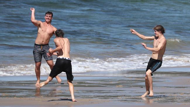 Schoolies enjoy Clarkes Beach in Byron Bay. Photograph: Jason O'Brien
