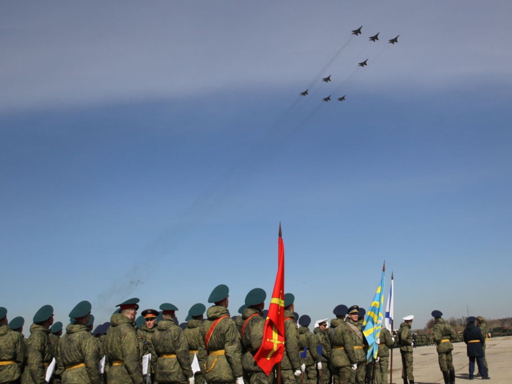 Jet fighters show the letter "Z", a symbol of the Russian military invasion of Ukraine, over the polygon during parade rehearsals.