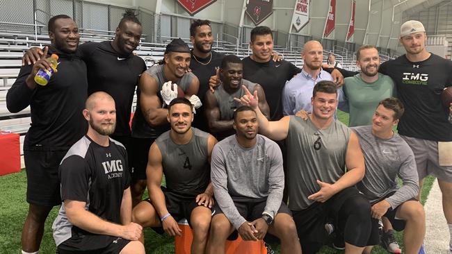 Holmes at the NFL tryouts with other combine hopefuls.