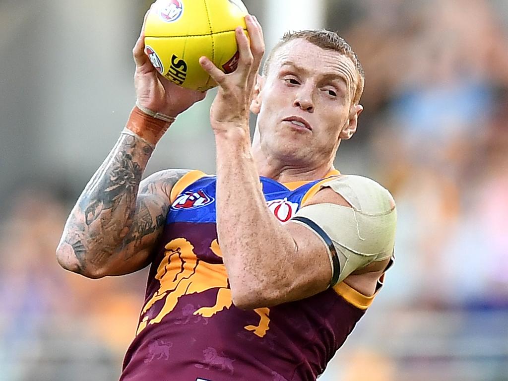 BRISBANE, AUSTRALIA - MAY 20: Mitch Robinson of the Lions takes a mark during the round nine AFL match between the Brisbane Lions and the Hawthorn Hawks at The Gabba on May 20, 2018 in Brisbane, Australia.  (Photo by Bradley Kanaris/Getty Images)