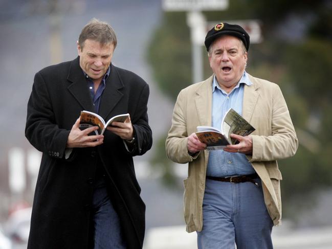 Charles Wooley, left, and Michael Tatlow meander their way along the streets of their old sandstone town at the launch of their informal guide to Battery Point, A Walk in Old Hobart, in 2008.