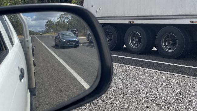 A new section of road south of Bowen with an extra-wide medium strip. Installing wide centre lines is meant to increase the distance between oncoming lanes of traffic, preventing head-on collisions.