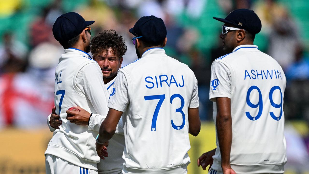 India's Kuldeep Yadav celebrates the wicket of Ben Stokes. Photo by Sajjad HUSSAIN / AFP.