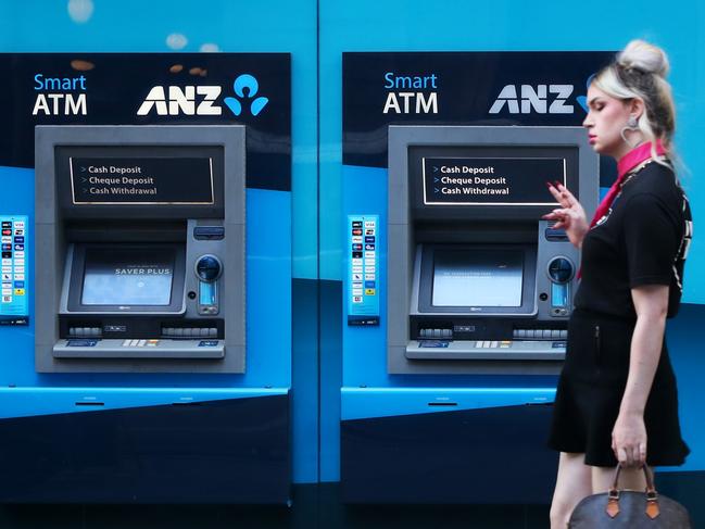 SYDNEY, AUSTRALIA - FEBRUARY 26: A pedestrian moves past a Australia & New Zealand Banking Group Ltd. (ANZ) branch in Sydney on February 26, 2024 in Sydney, Australia. The recent approval by the Australian Competition Tribunal of ANZ's A$4.9 billion ($3.2 billion) acquisition of Suncorp's banking business marks a major development in the country's financial landscape, signaling the largest banking merger since the global financial crisis. (Photo by Lisa Maree Williams/Getty Images)