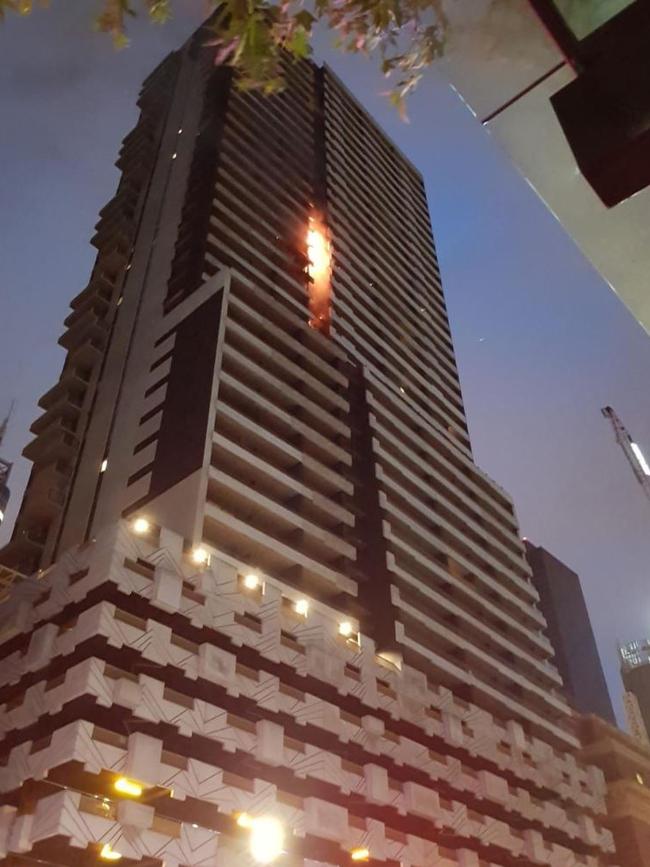 Fire flares in Melbourne’s Neo200 tower.