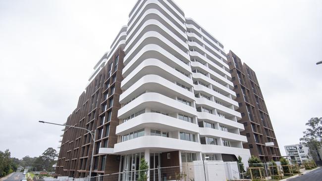 The Lumia development in Norwest in Sydney’s Hills District is one of many completed building that needs to be connected to power. Picture: Jeremy Piper