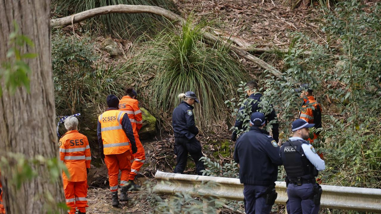 Police and SES at the scene where a woman’s body was found near a fire trail in Wahroonga. Picture: Tim Hunter.