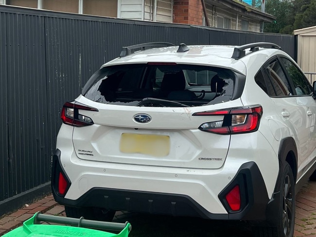 A smashed-up Subaru parked in the driveway. Picture: Supplied