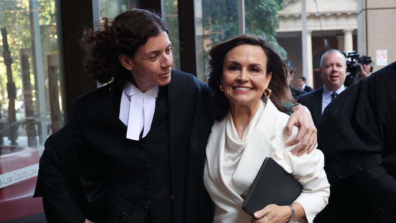 Sue Chrysanthou SC hugs Lisa Wilkinson as they emerge from court on April 15, 2024 in Sydney, Australia. Photo: Don Arnold/Getty Images
