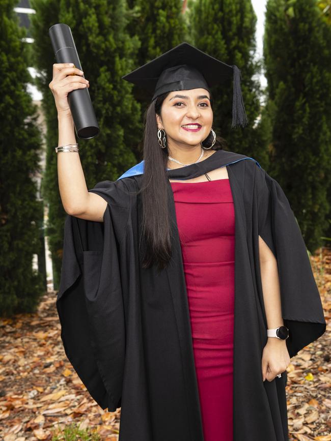 Yupika Gautam celebrates finishing her Bachelor of Nursing at the UniSQ graduation ceremony at Empire Theatres, Tuesday, December 13, 2022. Picture: Kevin Farmer