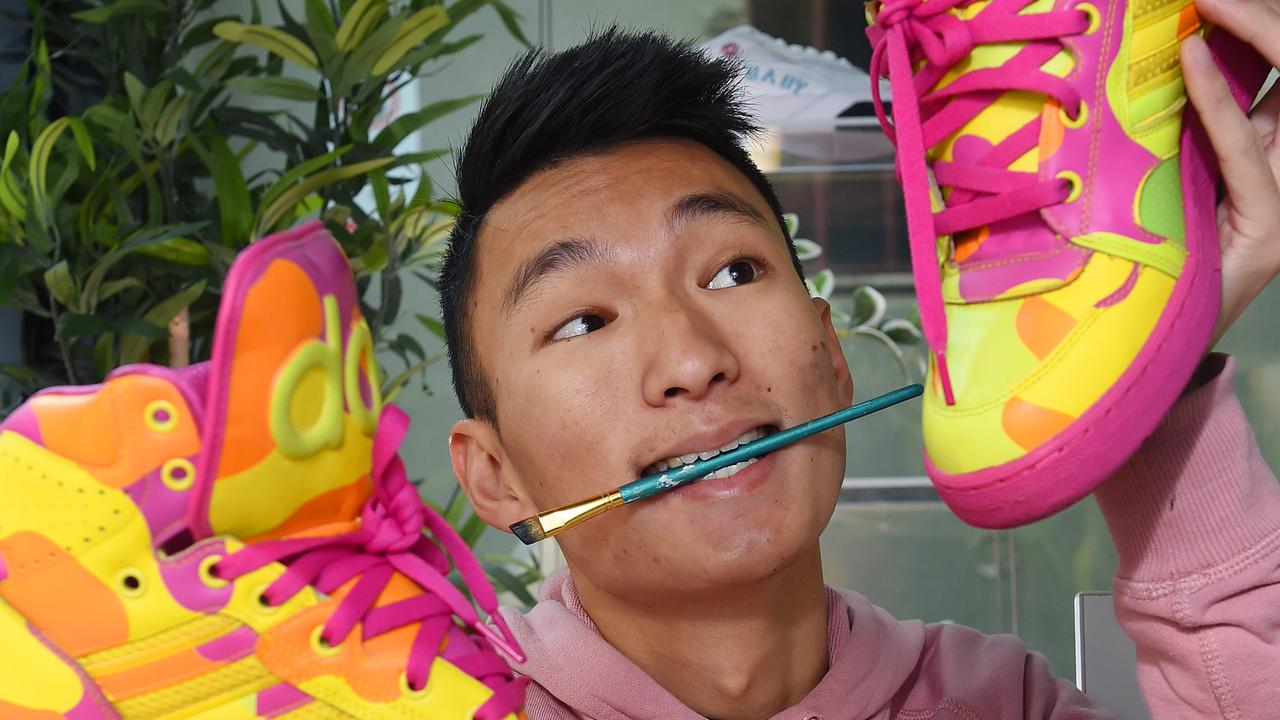 Victorians are being encouraged to repair and reuse items to reduce landfill. The Sneaker Laundry had restored thousands of shoes. Founder Eugene Cheng repairing some shoes. Picture: Josie Hayden