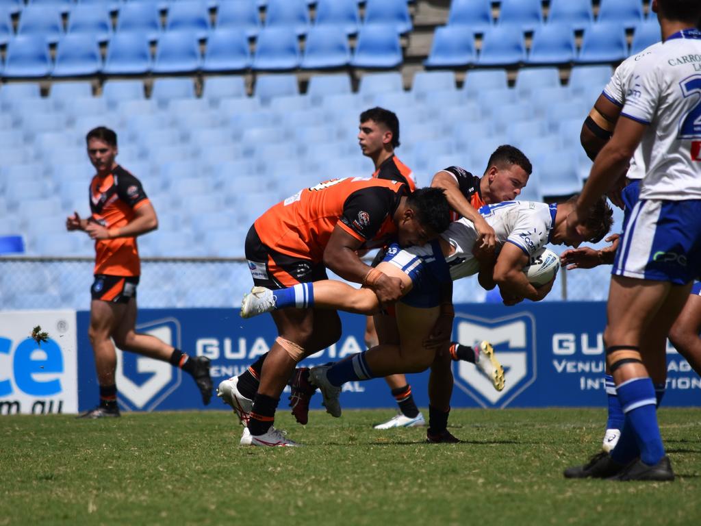 Massimo Mari is tackled by Elijah Mataale. Picture: Sean Teuma/NewsLocal