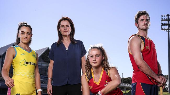 Juliet Haslam, SA's greatest hockey player, with current Hockeyroo, from left, Miki Spano, Zoe Nunn and state league player Lachie Busiko. Picture SARAH REED