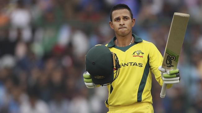 Australia's Usman Khawaja celebrates his century in the fifth ODI against India. Picture: AP