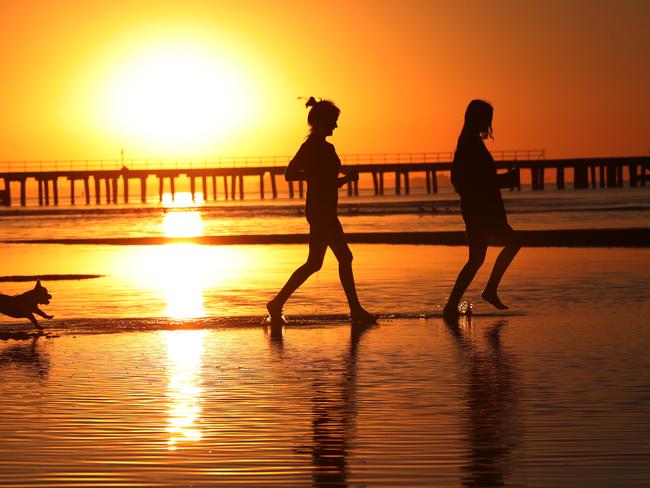 Sunrise at Altona Beach on Wednesday morning. Picture: David Crosling