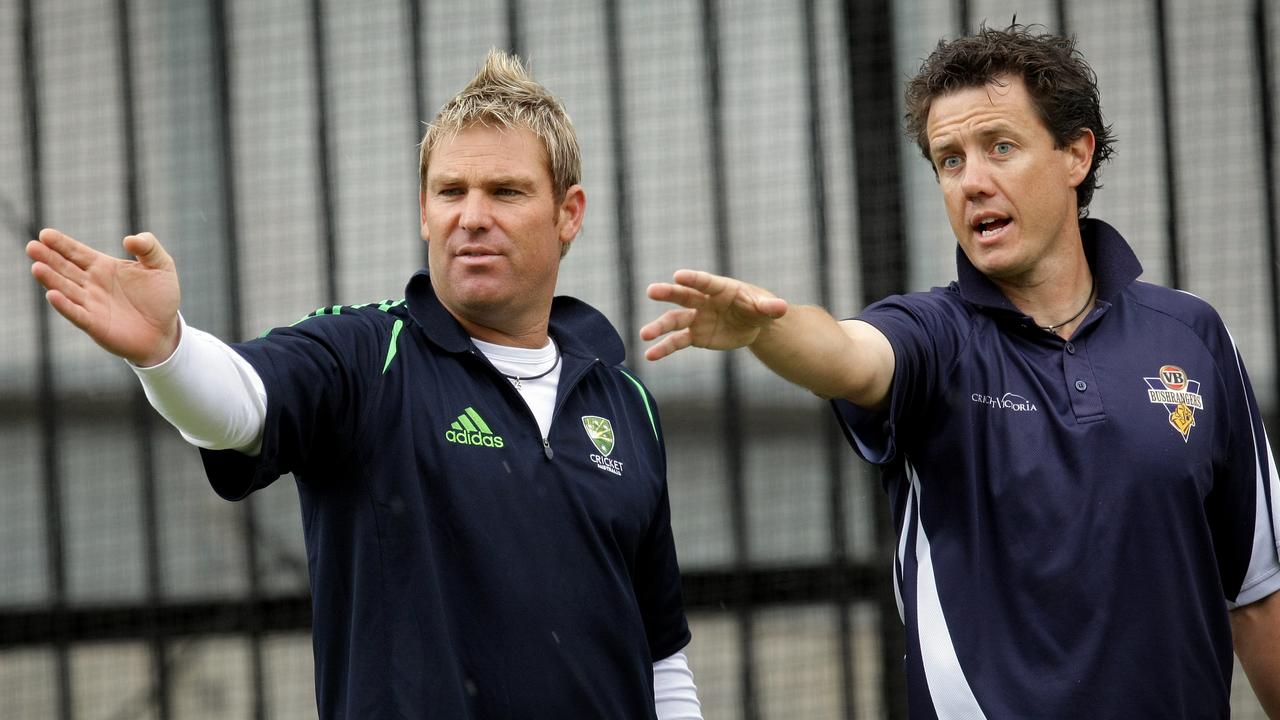 Warnie chats to fellow leg-spinner Bryce McGain at Victorian training.