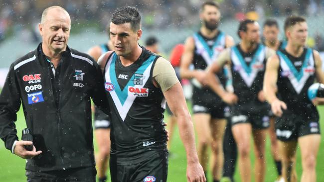 Port Adelaide coach Ken Hinkley with midfielder Tom Rockliff. Picture: AAP Image/David Mariuz