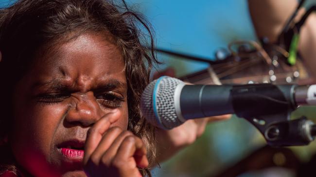 Local Barunga School student Lily, sings in the choir at the Music, Sport and Culture at the Barunga Festival. Picture Glenn Campbell