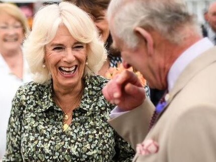 Queen Camilla has had a cheeky dig at King Charles over his likeness to a pie. Picture: Getty Images via AFP