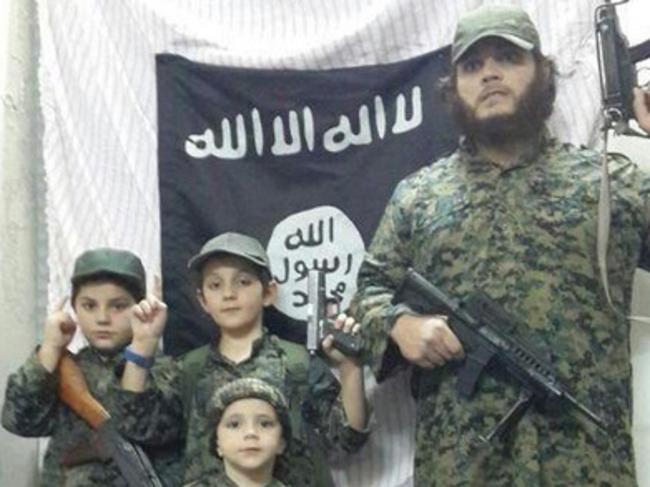 Khaled Sharrouf posted this photo on Twitter of himself and sons in propaganda pose.