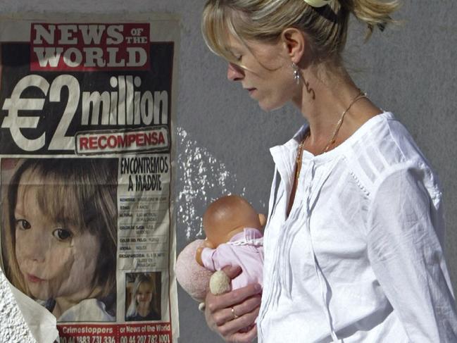 Kate McCann passes a poster describing the disappearance of her daughter in 2007. Picture: AFP