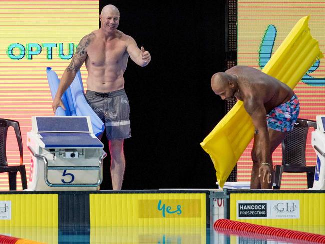 Barry Hall and Lote Tuqiri bring along some buoyancy aids.