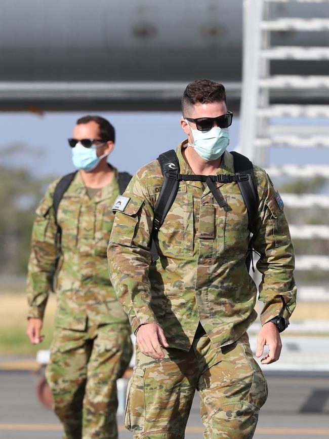 ADF members from Townsville arrive in Hobart to assist with the arrival of seasonal workers from Timor-Leste and the scheduled chartered flight from India. Picture: NIKKI DAVIS-JONES