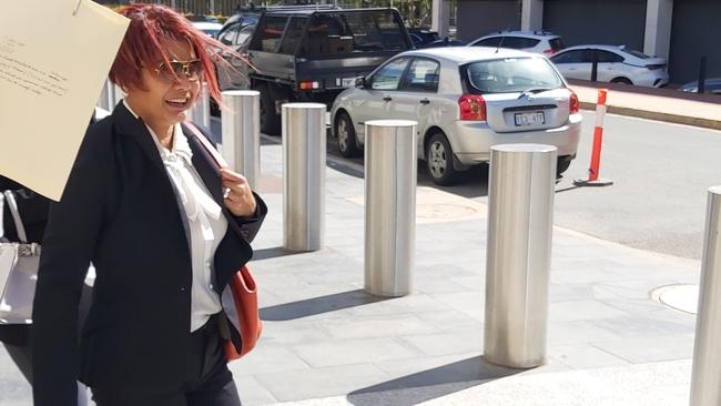 Sisouk Rajbandith leaves Canberra Magistrates Court after being fined $10,000 for breaches of the Food Act at her former restaurant, Two Sisters Laos Thai Cuisine in the Canberra CBD. Picture: Craig Dunlop