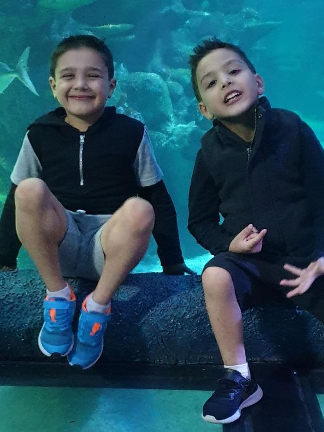 Xavier (l) and Peter on a family trip to the aquarium.