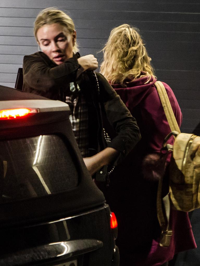 Viktoria Karida, John Macris wife, arrives at home days after her husband was killed. Picture: Angelos Christofilopoulos/News Corp