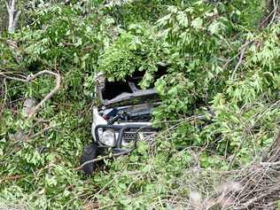 A car, found in an embankment in Shute Harbour on Saturday was allegedly stolen. . Picture: Claudia Alp