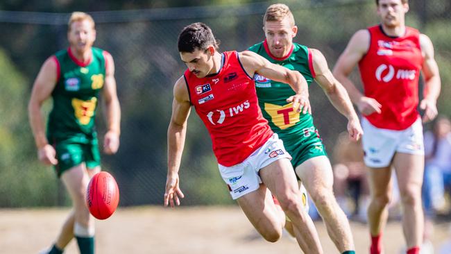 Tasmania captain Brad Cox-Goodyer chases his Norwood opponent. Picture: Solstice Digital