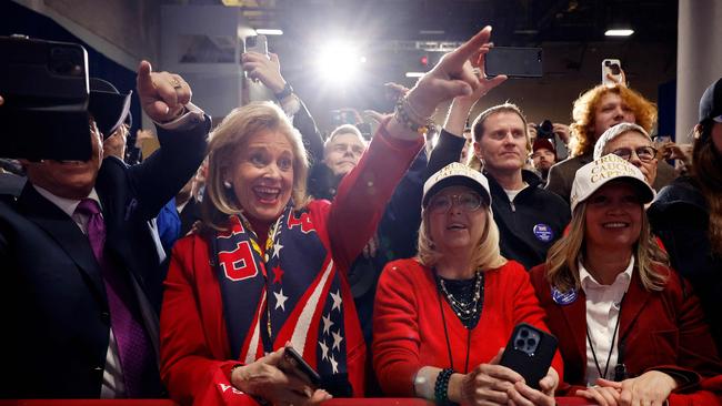 Supporters Donald Trump cheer during his caucus night event at the Iowa Events Center in Des Moines, Iowa. Picture: Getty Images