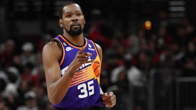 CHICAGO, ILLINOIS - MARCH 03: Kevin Durant #35 of the Phoenix Suns reacts after scoring in the second half against the Chicago Bulls at United Center on March 03, 2023 in Chicago, Illinois. NOTE TO USER: User expressly acknowledges and agrees that, by downloading and or using this photograph, User is consenting to the terms and conditions of the Getty Images License Agreement.   Quinn Harris/Getty Images/AFP (Photo by Quinn Harris / GETTY IMAGES NORTH AMERICA / Getty Images via AFP)