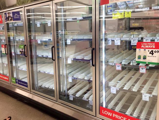 The shelves at Woolworths in Ayr pictured two days before Cyclone Debbie hits.